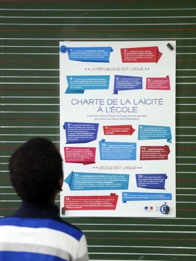 Tableau sur la laïcité à l'école en 2014 à l'école Louis Aragon, dans la banlieue nord de Paris, à Pantin, à l'occasion de la Journée nationale de la laïcité