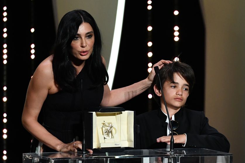 Nadine Labaki avec l'acteur syrien Zain al-Rafeea à la remise du prix du Jury pour son film "Capharnaum au Festival de Cannes 2018.