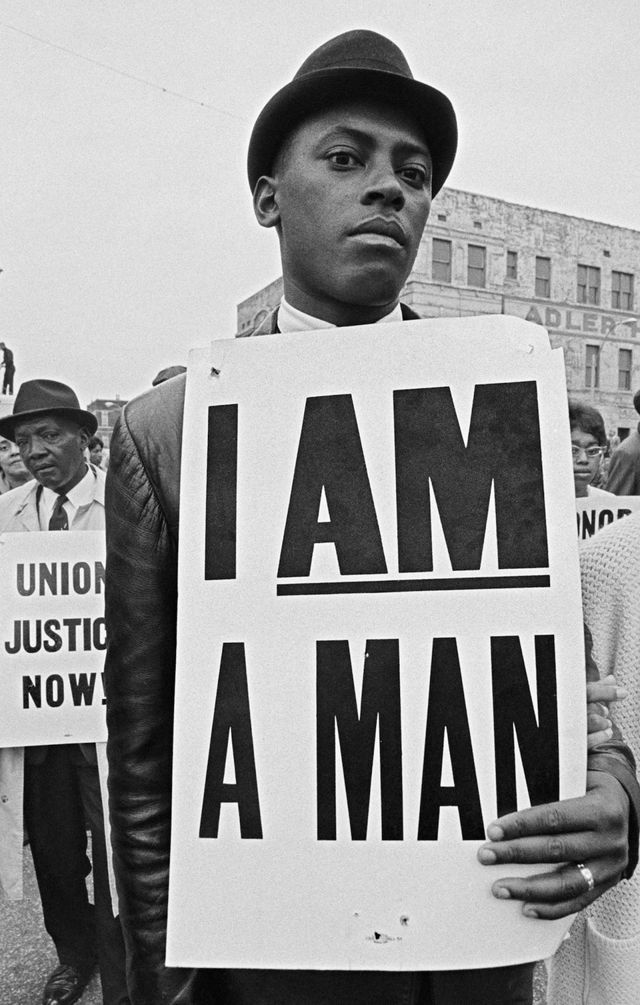 Mourner with sign at the King memorial service, 1968