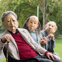 Hommes masqués au festival d'Edinburgh, août 2018