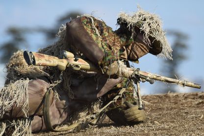 Un artilleur de l'armée japonaise lors d'un exercice à Narashino, le 13 janvier 2019. Un artilleur de l'armée japonaise lors d'un exercice à Narashino, le 13 janvier 2019.