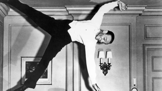 Actor and dancer Fred Astaire (1899-1987) pictured during a scene from the film, 'Royal Wedding', USA, circa 1951. The dramatic scene appears to show Astaire dancing on a wall ©Getty - Archive Photos