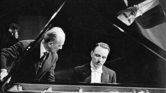 26th June 1959: Italian pianist Arturo Benedetti Michelangeli (1920 - 1995), (right), and his tuner Ettore Tallone at the piano during a concert tour ©Getty - Erich Auerbach