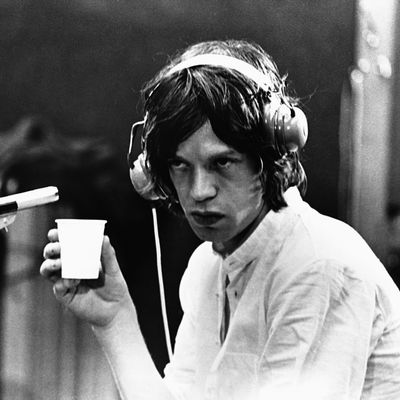 Godard directs the Rolling Stones. Rolling Stones with Jean Luc Godard on set of One Plus One