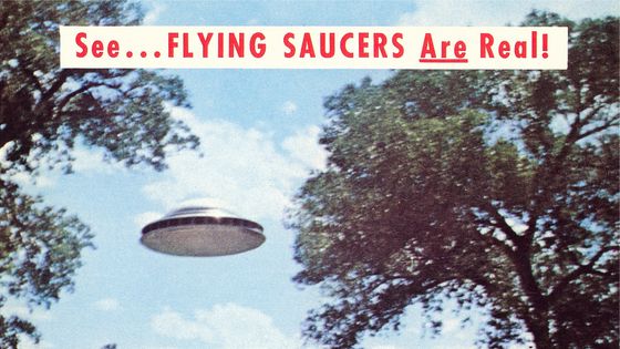 Vintage color photograph of a flying saucer ‘ See….Flying Saucers are Real ! ' ©Getty - Found Image Holdings/Corbis via Getty Images