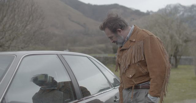 Jean Dujardin et son blouson