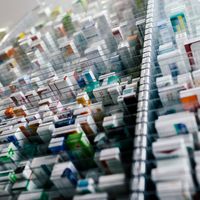 Medicine in shelves in commissioning machine in pharmacy