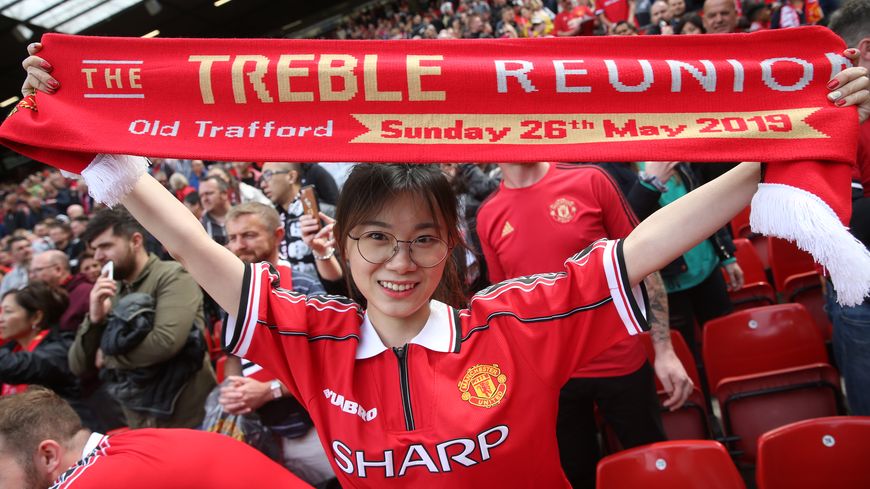 MANCHESTER, ENGLAND - MAY 26: A Manchester United fan shows her support during the 20 Years Treble Reunion match between Manchester United '99 Legends and FC Bayern Legends at Old Trafford on May 26, 2019 in Manchester, England.