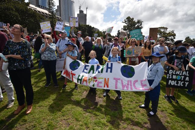 Des manifestants attendent pour le départ de la marche de Sidney.