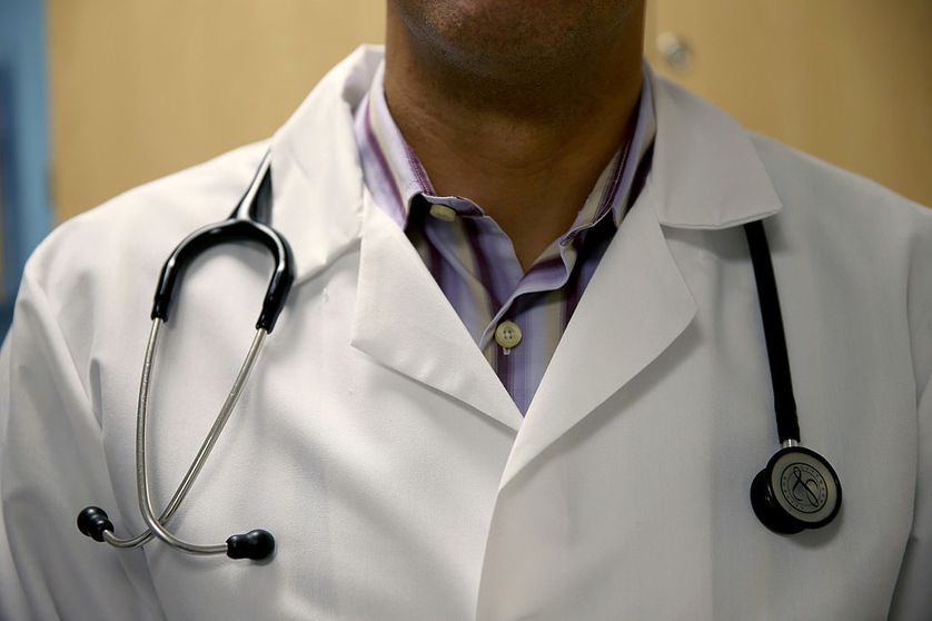 MIAMI, FL - JUNE 02: A doctor wears a stethoscope as he see a patient for a measles vaccination during a visit to the Miami Children's Hospital on June 02, 2014 in Miami, Florida.