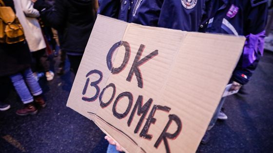 Panneau "OK Bommer" photographié lors de la marche contre les violences sexistes et sexuelles du 23 novembre 2019. ©AFP - Laure Boyer / Hans Lucas