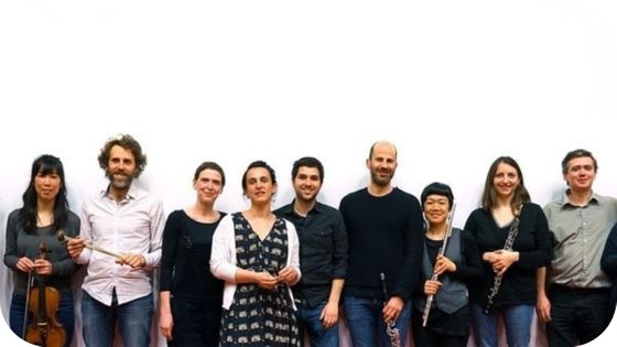 Les membres de L'instant Donné et Mikel Urquiza au milieu, par Rémy Jannin