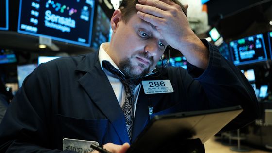 Un trader à la Bourse de New-York ©AFP - SPENCER PLATT / GETTY IMAGES NORTH AMERICA