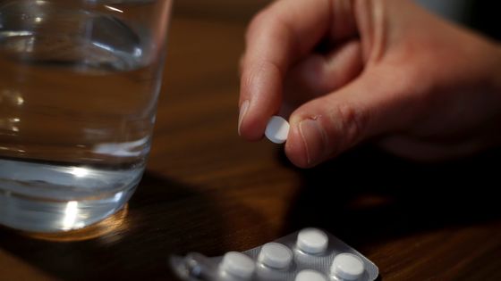 Prise de chloroquine ©Maxppp - Jean François Ottonello