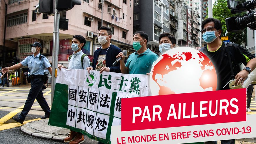 Des manifestants pro-démocratie protestent le 22 mai à Hong Kong contre "la destruction du principe d'un pays/deux systèmes" par la Chine