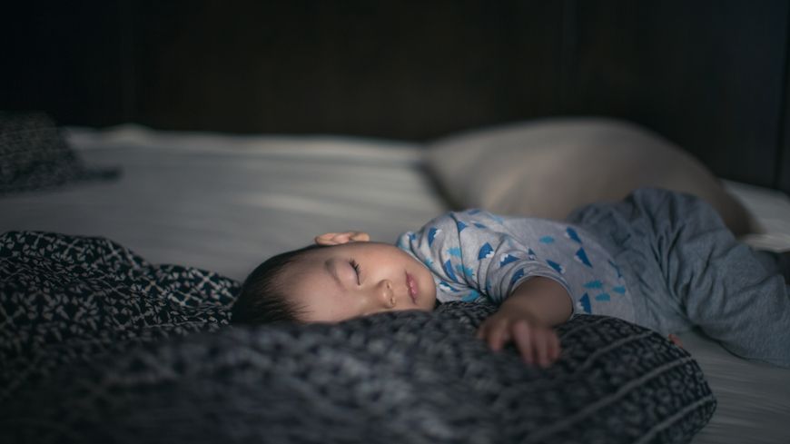 Bébé endormi. Shangai, Chine.