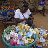 Une "bonne dame" sur le marché de Gbossimé à Lomé (Togo) le 20 janvier 2020.