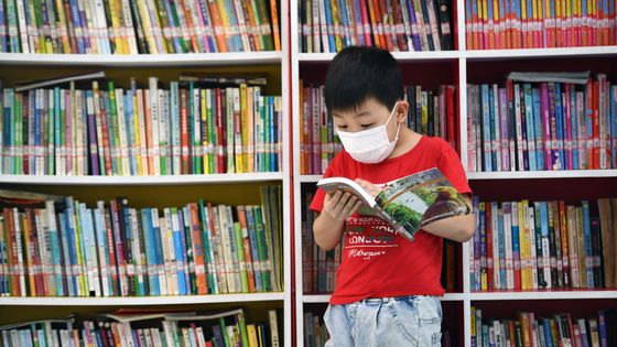 lecture pendant les vancaces d'été 2020 à Huai'an ©Getty