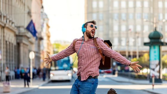 Cheerful man dancing leisurely while listening to music ©Getty - -