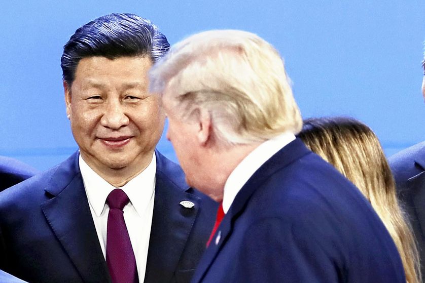 President xinès XI JINPing observant l'arribada de Donald Trump per a la foto de G20 de Buenos. Aires, al novembre de 2018.'arrivée de Donald Trump pour la photo du G20 de Buenos Aires, en novembre 2018.