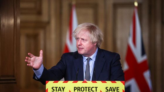 Le Premier ministre britannique Boris Johnson fait le point sur la pandémie de coronavirus Covid-19 lors d'une conférence de presse virtuelle au 10 Downing Street, centre de Londres, le 23 mars 2021. ©AFP - HANNAH MCKAY / POOL