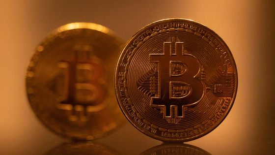 Une plateforme d'échange de bitcoin, Coinbase, vaut autant que BNP Paribas ©AFP - Nicolas Economou / NurPhoto / NurPhoto