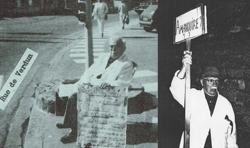 Isidore III avec ses pancartes