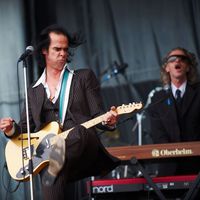 Nick Cave et les Bad Seeds au Glastonbury Festival en 2009. (Gary Wolstenholme/Redferns)