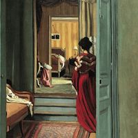 "Intérieur avec femme en rouge de dos"