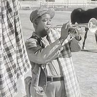 Louis Armstrong dans le film "Going Places" réalisé par Ray Enright, sorti en 1938