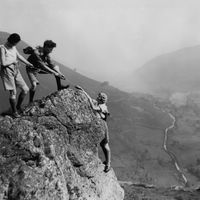 4th September 1931: Mrs Smith and two friends reach the top of a bluff in North Wales during a mountain hike.