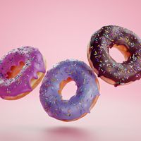 Trois donuts sucre glace en lévitation
