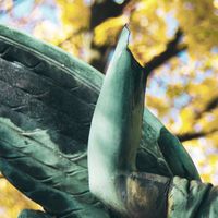 Low Angle View Of Statue Against Trees