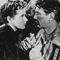Ingrid Bergman et Gary Cooper dans une scène du film de Sam Wood "Pour qui sonne le glas" (1943), adapté du roman d' Ernest Hemingway (1940)