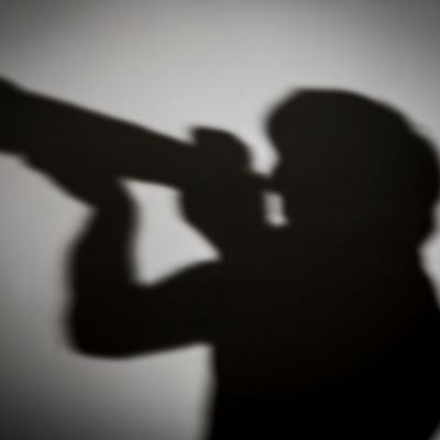 Silhouette floue d'un photographe
